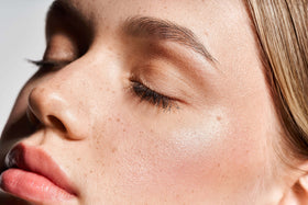 Beauty Shopify theme Beautify. Close-up of a person with closed eyes and visible skin texture.