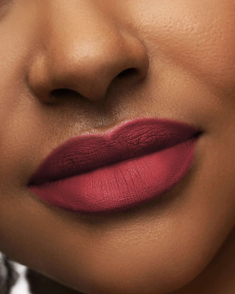 Beauty Shopify Theme Beautify. Close-up of a person's lips with a focus on the lipstick color.