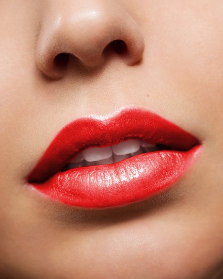 Beauty Shopify Theme Beautify. Close-up of a person's lips with a focus on the lipstick color.