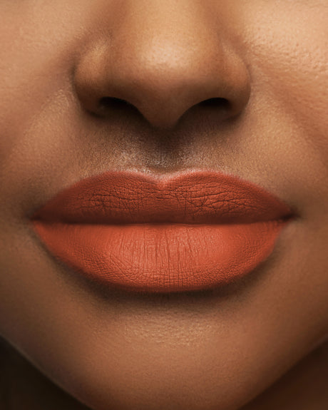 Beauty Shopify Theme Beautify. Close-up of a person's lips with a focus on the lipstick color.