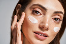 Beauty Shopify Theme Beautify Woman applying face cream to cheeks
