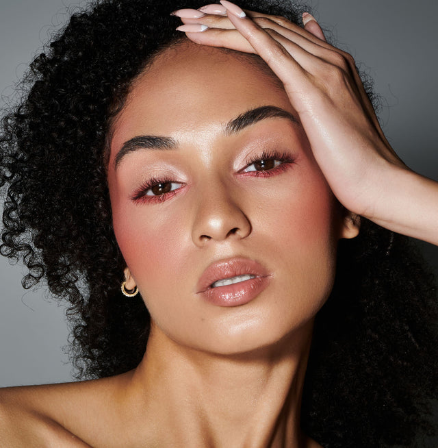 Beauty Shopify Theme Beautify. Woman with curly hair and makeup